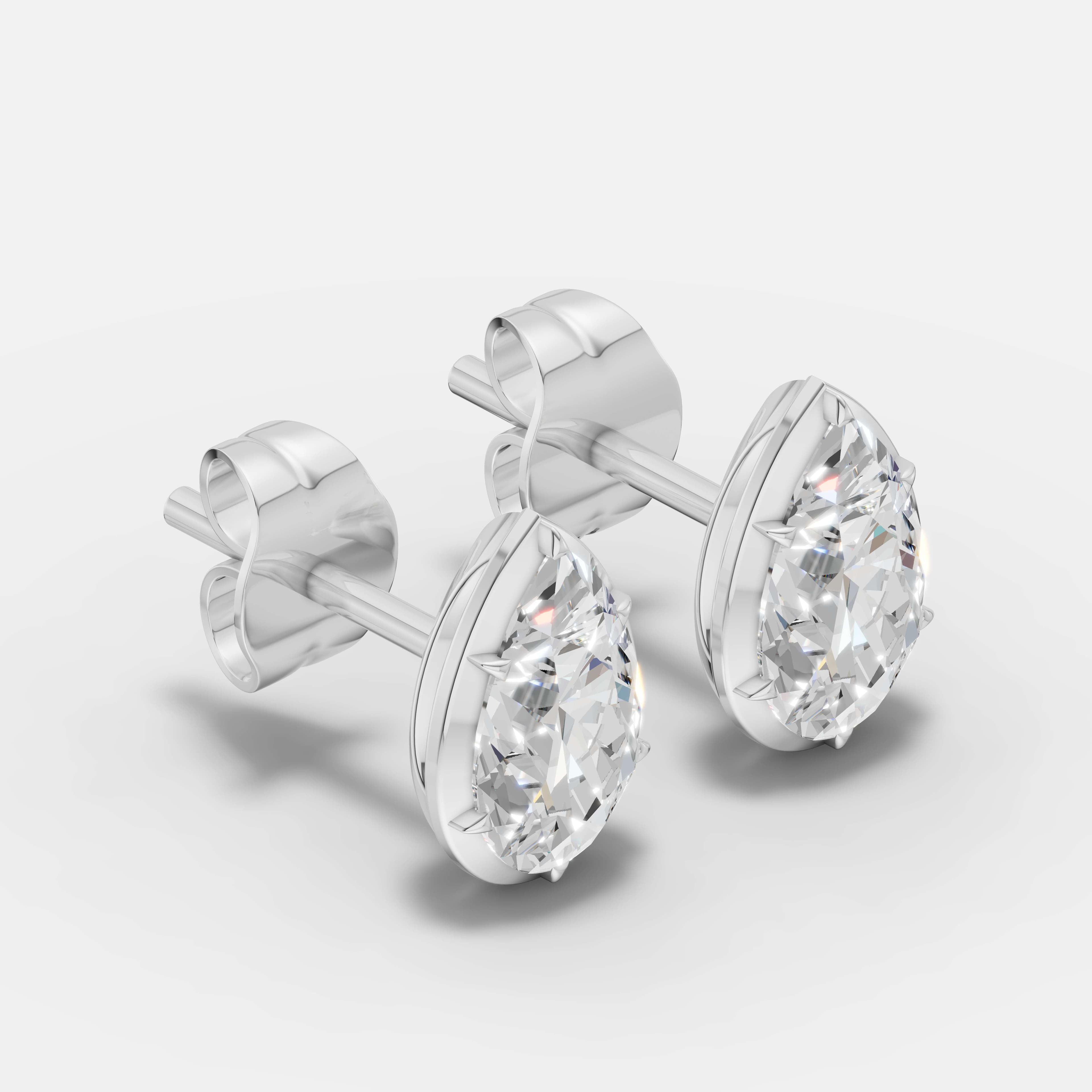Classic Pear Diamond Studs - 2